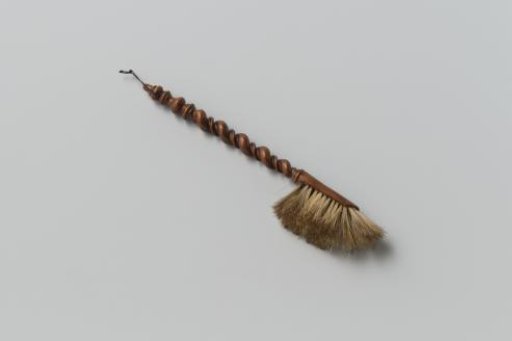 Walnut and boar's hair dustpan; round back, with hair inlaid on the lower and sloping front; long stem, finely turned with double twist, baluster and knob