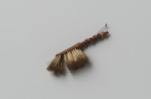 Walnut and boar's hair dustpan; round back, with hair inlaid on the lower and sloping front; long stem, finely turned with double twist (wide and narrow) and knob