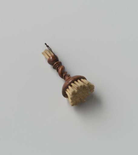 Walnut and boar's hair table brush or broom; broad round head with hair, finely turned stem with double twist (narrow and wide), ending in a small round head also with hair