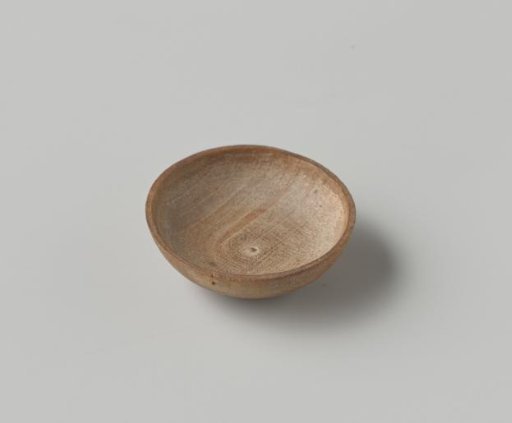 Round bowl turned from maple wood; small hole under the rim for a cord