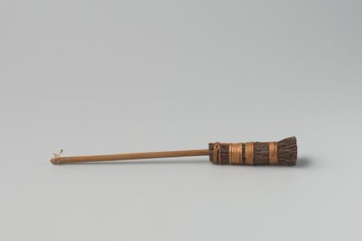 Broom, consisting of a bundle of twigs bound with willow twine, into which is inserted a smooth stem of pine wood with five profiled rings at the top (for cords)