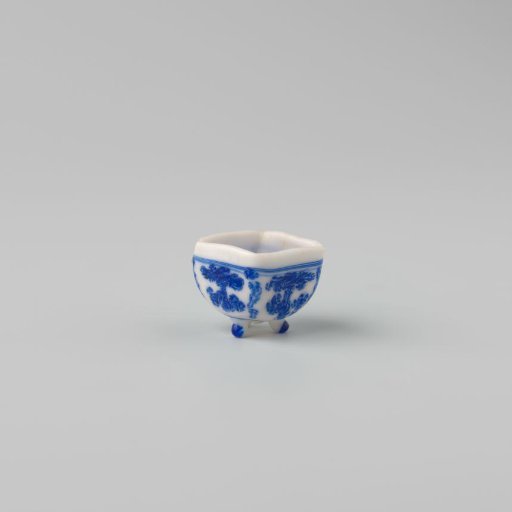 Milk glass fire test with blue enamel painting, imitation Chinese porcelain; square dish on three feet with handle; decoration of floral motifs in four compartments.