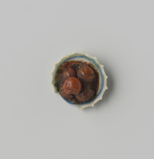 Milk glass dish with blue enamel painting, imitation Chinese porcelain; double-walled dish, the rim pinched into points.