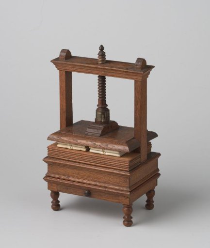 Linen press on a stand with four baluster feet