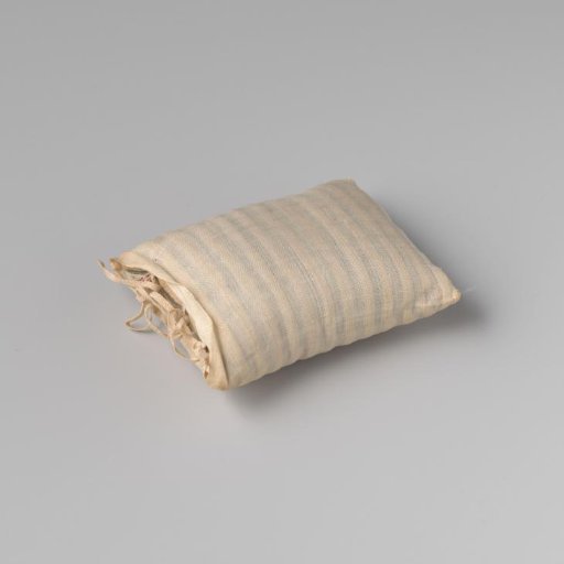 Cushion of blue-white striped linen/cotton fabric; sewn-on 'blinkerd' of light pink silk on one short side; filled with down