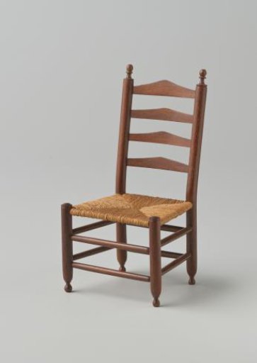 Knob chair made of hardwood with smooth, turned stiles and cross rails; front legs and back stiles ending in finely turned knobs