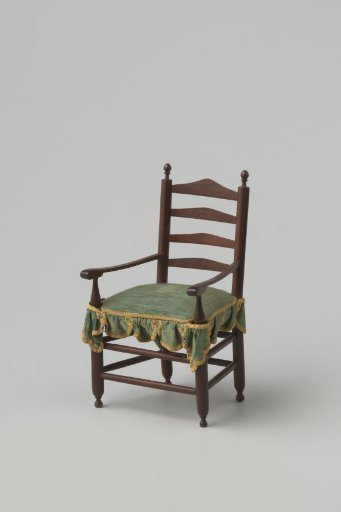 Knob chair made of hardwood with smooth, turned stiles and cross rails; front legs and back stiles ending in finely turned knobs
