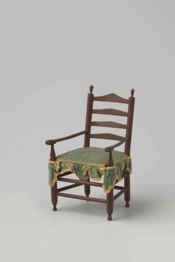 Knob chair made of hardwood with smooth, turned stiles and cross rails; front legs and back stiles ending in finely turned knobs
