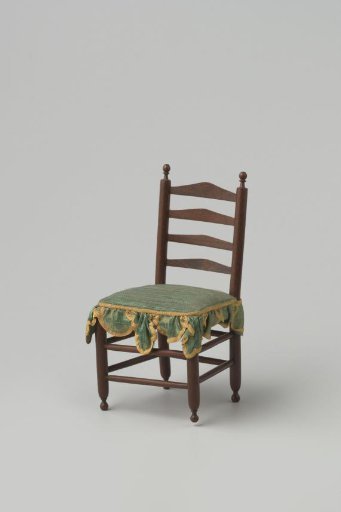 Knob chair made of hardwood with smooth, turned stiles and cross rails; front legs and back stiles ending in finely turned knobs