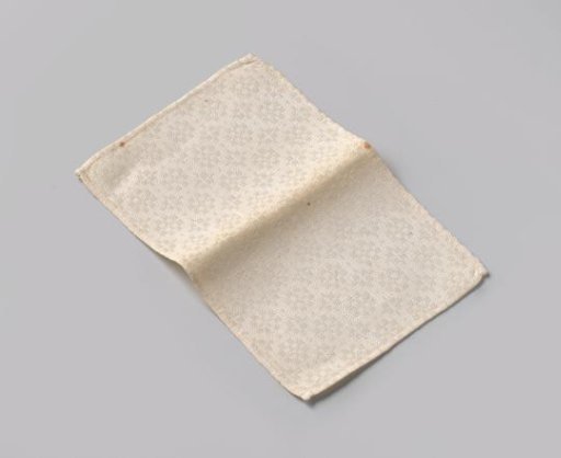 Linen napkin of damask weave with pelican pattern (motif II), hemmed on four sides