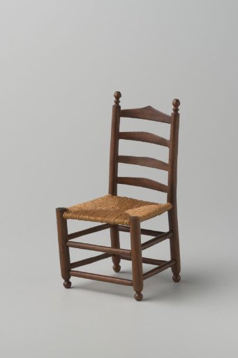 Knob chair with woven rush seat