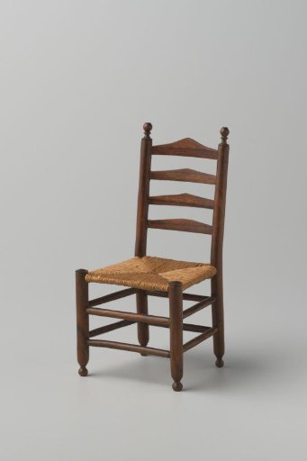 Knob chair with woven rush seat