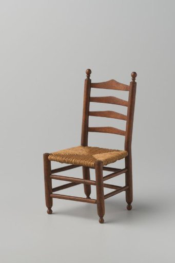 Knob chair with woven rush seat