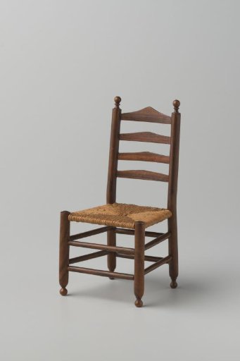 Knob chair with woven rush seat