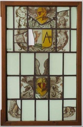 Lozenge with coat of arms fragments