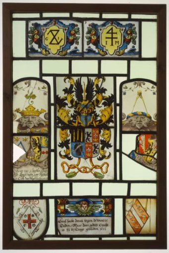 Lozenge with helmet badge, coats of arms, cartouches and inscription