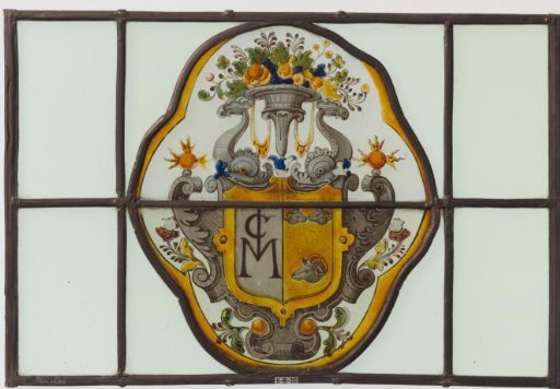 Two coats of arms in quatrefoil medallions
