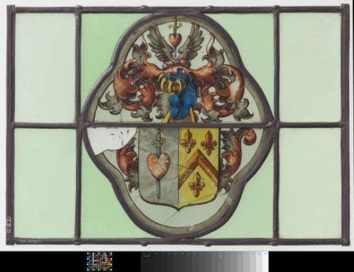 Lozenge with quatrefoil medallion containing a coat of arms, in the shield a red heart pierced by a sword