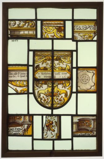 Lozenge with architectural fragments and a coat of arms with cartouche and inscription