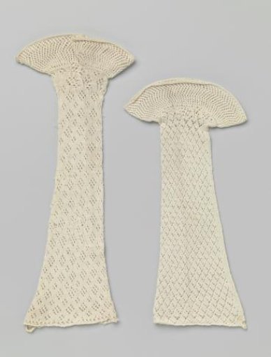 White knitted cotton mitten in openwork