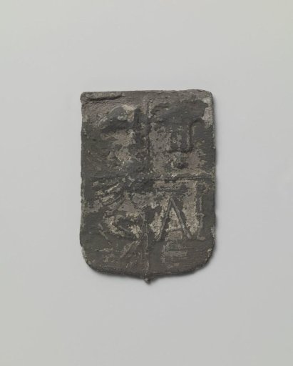 Lead sheet, shield-shaped, for covering the nails of a lead roof covering