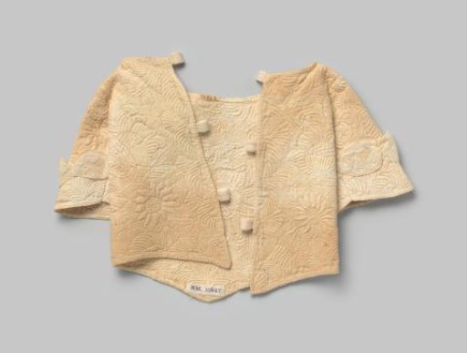 Child's jacket of white linen with floral motifs in Zaan embroidery, decorated with Mechelen lace