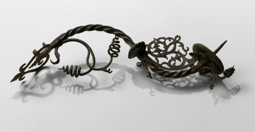 Lamp arm of wrought iron, twisted and S-shaped