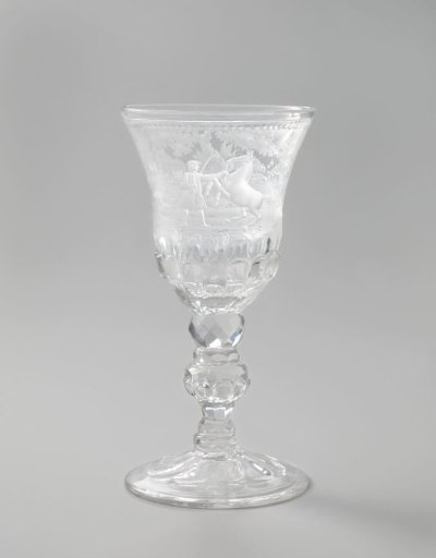 Cup with a rider next to a rearing horse and a deer hunt