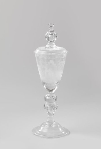 Bowl with a three-master, a factory, and the inscription: T. WELVAREN VAN DE NEGOTIE