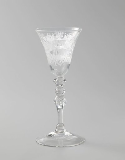 Wine glass with clasped hands and a putto by a vat