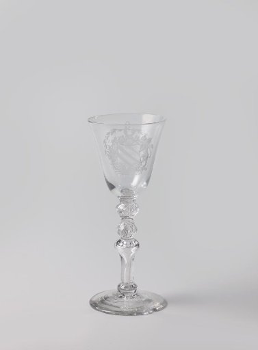 Chalice glass with a family coat of arms and the inscription: THE WELL-BEING OF THE DISTRICT 11