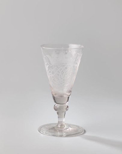Chalice glass with the crowned monogram AVA twice between palm branches