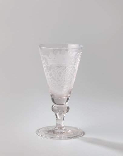 Chalice glass with the crowned monogram AVA twice between palm branches