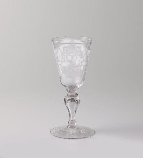 Goblet with a Chinese man smoking a pipe and playing bagpipes
