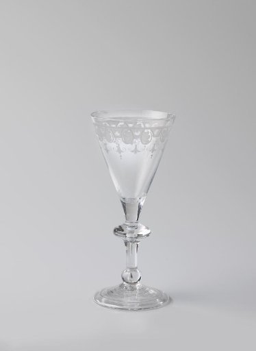 Chalice glass with an ornamental border