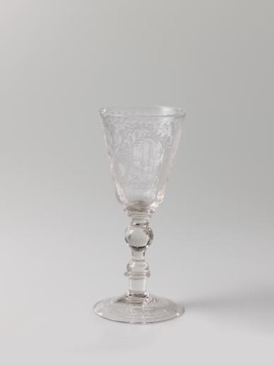 Vase with sunflowers, dots and ovals