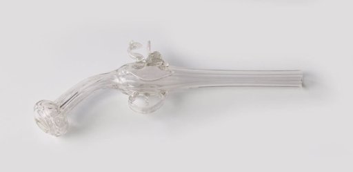 Glass in the shape of a pistol