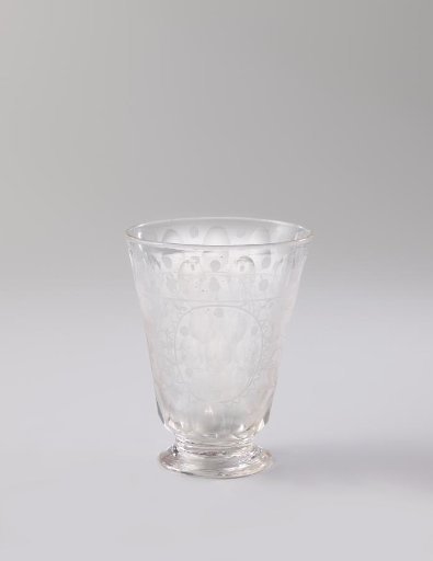 Goblet on a foot with clusters consisting of rosettes and circles