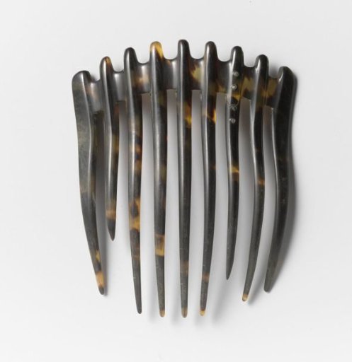 Tortoiseshell Comb with Narrow Back, with a Rounded Pinacle Above Each Tooth