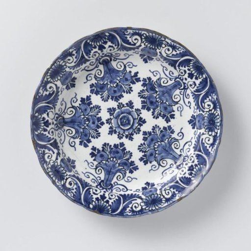 Round plate of blue-painted faience