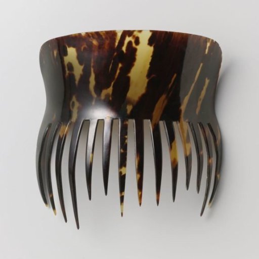 Imitation Tortoiseshell Comb with High, Smooth, Raised Back; with Fourteen Teeth of Varying Length