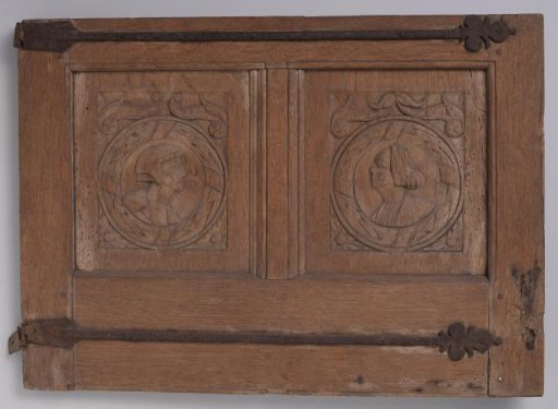 Panel or Cabinet Door with Carved Heads and Profiles in Medallions