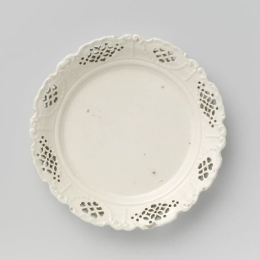 Fruit bowl of hard-baked earthenware, with pierced rim, creamware.