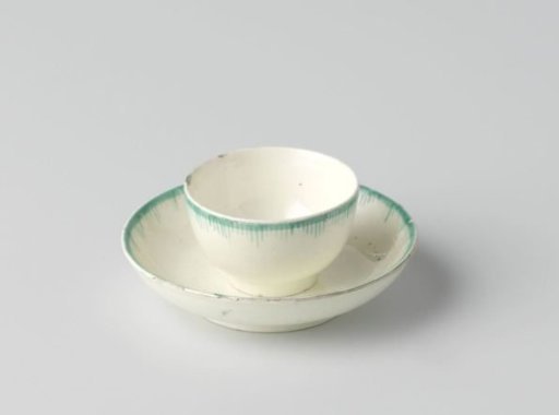 Cup and saucer of hard-fired earthenware, creamware.