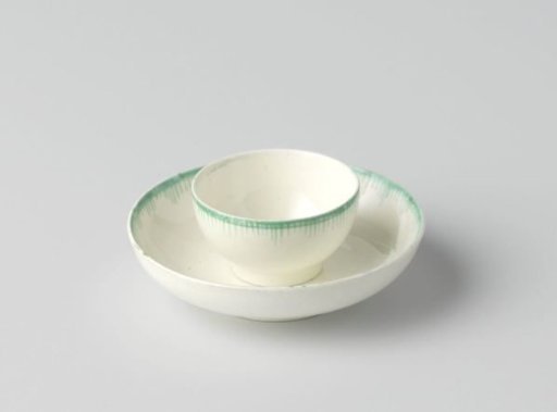 Cup and saucer of hard-fired earthenware, creamware.