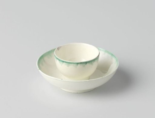 Cup and saucer of hard-fired earthenware, creamware.