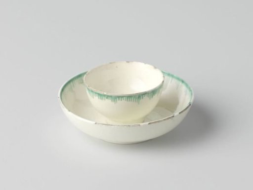 Cup and saucer of hard-fired earthenware, creamware.
