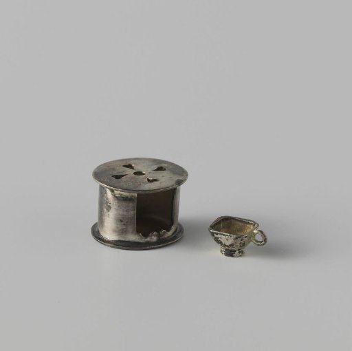 Stove with sawn-out hearts