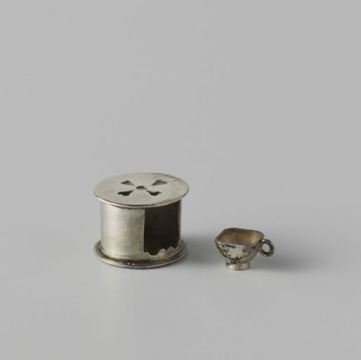 Stove with sawn-out hearts