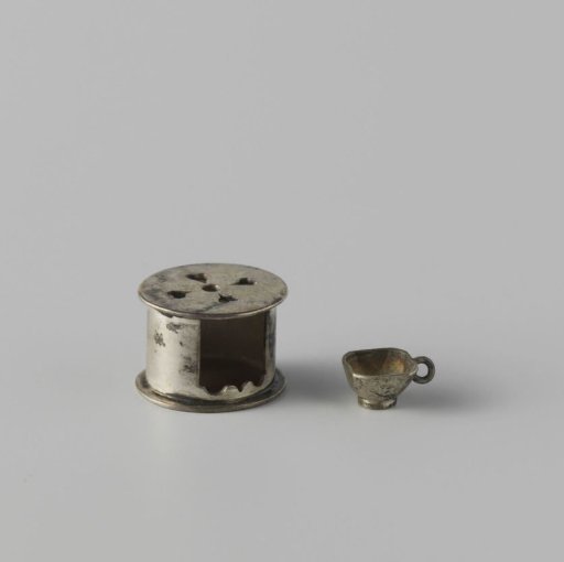 Stove with sawn-out hearts